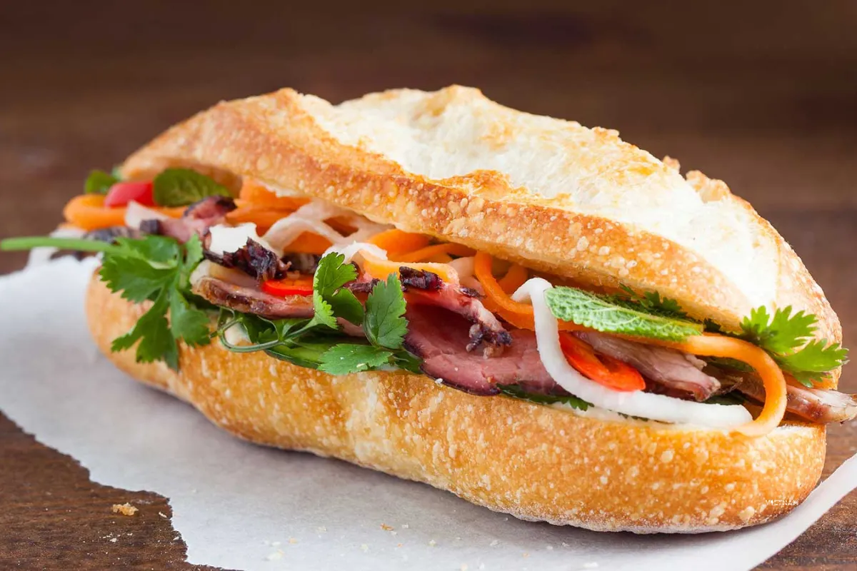 Exclusive Hanoi Street Food Tour | Discover Hanoi’s Best Eats on Foot Banh mi Vietnam crispy baguette sandwich