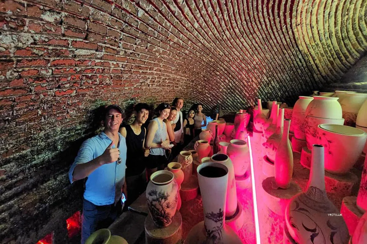 Hanoi Cycling Tour | Bat Trang, Kim Lan & Xuan Quan Flower Villages Bat Trang ceramic village artisans shaping clay