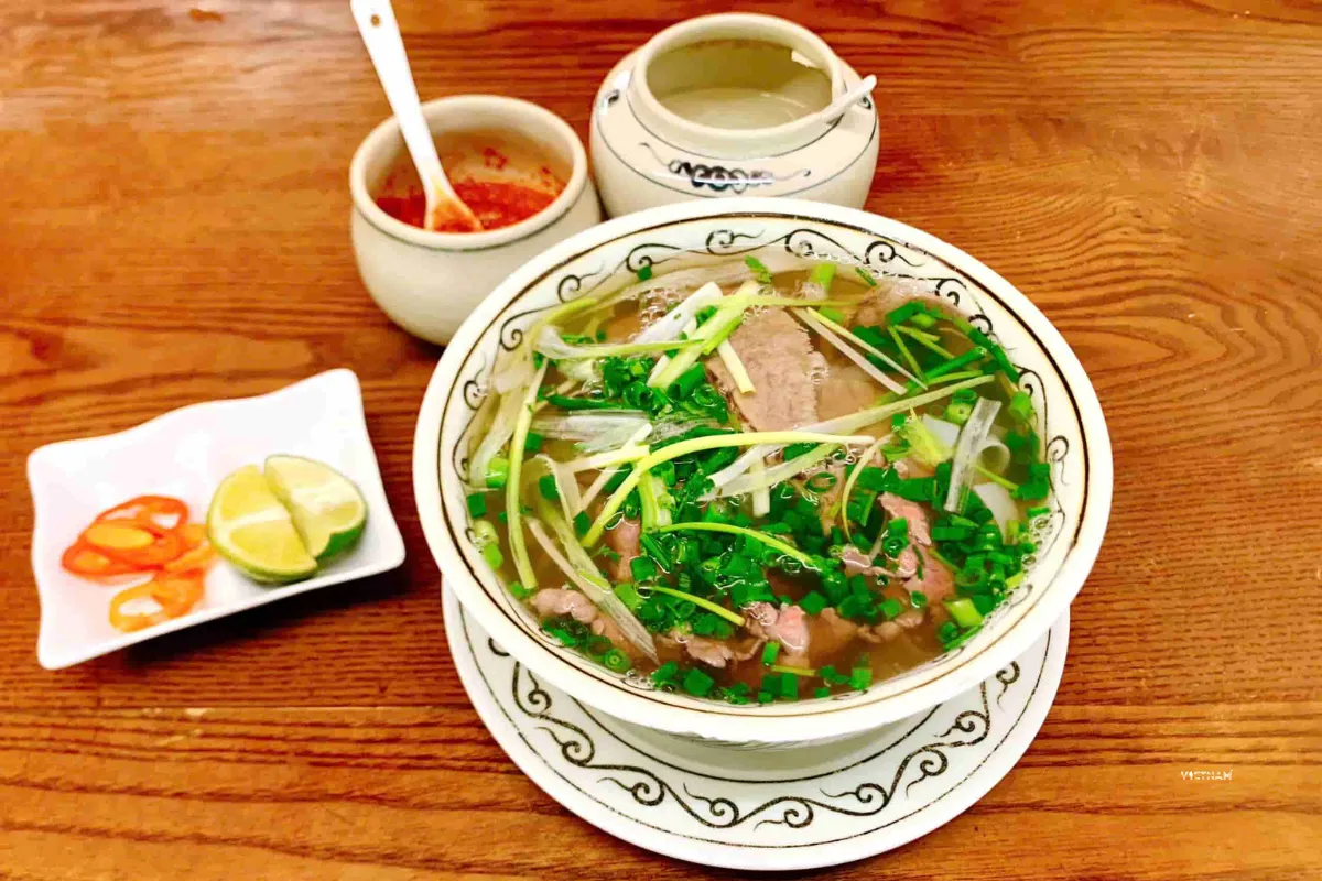 Exclusive Hanoi Street Food Tour | Discover Hanoi’s Best Eats on Foot Pho bo Hanoi beef noodle soup bowl