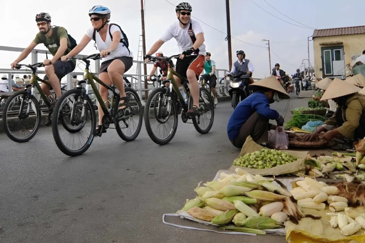Hanoi Cycling Tour | Bat Trang, Kim Lan & Xuan Quan Flower Villages Tour Hanoi bicycle exploring local neighborhoods