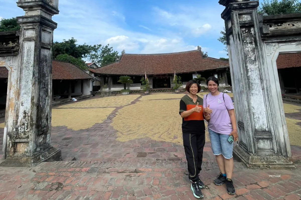 Authentic Hanoi Day Tour | Incense Village & Duong Lam Ancient Village Mong Phu communal house entrance in Duong Lam ancient village